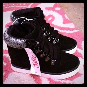 Justice black sneaker boots with heel on inside.